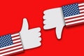 Hands showing thumbs up and thumbs down with sleeves as the American flag. USA presidential election concept Royalty Free Stock Photo