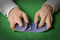 Hands shuffling cards in casino Royalty Free Stock Photo