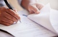 Hands, signature and writing on contract for deal at record company for music license in office. Person, legal paperwork Royalty Free Stock Photo