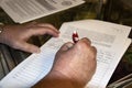 Hands signing petition for recreational marijuana to be put on ballot in Nov 2018 Royalty Free Stock Photo