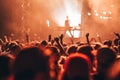 Hands silhouette in the air on concert, party in summer music festival. Entertainment, group dance, DJ play music, people have fun Royalty Free Stock Photo