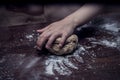 Hands skillfully knead the dough