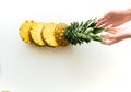 Hands with sliced fresh pineapple Royalty Free Stock Photo