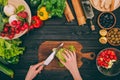 Hands slicing salad Royalty Free Stock Photo