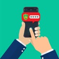 Hands with smartphone unlocked with fingerprint