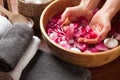 Hands spa, beautiful woman's hands in bowl of water