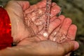 Hands splayed under a tap with water falling on them Royalty Free Stock Photo