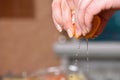 Hands squeeze juice from fresh and juicy orange Royalty Free Stock Photo
