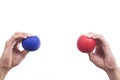 Hands squeezing a stress balls Royalty Free Stock Photo
