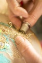 Hands Stitching Gold-Threaded Embroidery Royalty Free Stock Photo