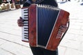 Hands of a street busker accordionist