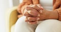 Hands, stress and senior woman on a sofa with anxiety, fear or grief, dementia or scared in her home. Stress, worry and Royalty Free Stock Photo