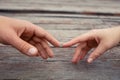 Hands stretching towards each other Royalty Free Stock Photo