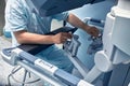 Hands of a surgeon at a computer robot. medical robot. Robotic Surgery.