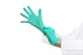 Hands in surgical gloves