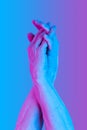 Hands in a surreal style in violet blue neon colors. Modern psychedelic creative element with human palm for posters