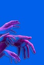 Hands in a surreal style in violet blue neon colors. Modern psychedelic creative element with human palm for posters