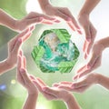 Hands surrounding green planet protected by recycle sign leaf on blurred bokeh .Elements of this image furnished by NASA Royalty Free Stock Photo