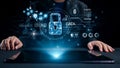 Hands on a Tablet Surrounded by Digital Security Icons Representing Data Protection and Cybersecurity in a Modern Royalty Free Stock Photo