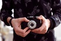 Hands taking photo with retro camera close-up Royalty Free Stock Photo