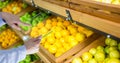 Hands taking picture of lemons with transparent device Royalty Free Stock Photo