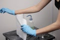 hands of a tattoo artist. Sterility and safety.  Disposable rubber gloves and disposable towels Royalty Free Stock Photo