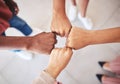 Hands, teamwork and collaboration with a team of business people joining their fists in a circle in solidarity, unity Royalty Free Stock Photo