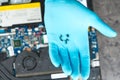 Hands of a technician repairing a broken laptop computer Royalty Free Stock Photo