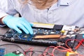 Hands of a technician repairing a broken laptop computer Royalty Free Stock Photo