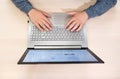 The hands of a teenager work on a modern laptop. Home schooling Royalty Free Stock Photo