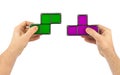 Hands with tetris toy blocks