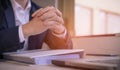 Hands of a thoughtful, hr recruiter making hiring decision at difficult job interview Royalty Free Stock Photo