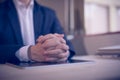 Hands of a thoughtful, hr recruiter making hiring decision at difficult job interview Royalty Free Stock Photo