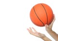 Hands throwing or catching a basketball ball isolated Royalty Free Stock Photo