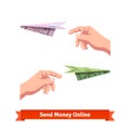 Hands throwing a dollar and euro paper planes Royalty Free Stock Photo