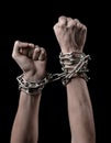 Hands tied chain, kidnapping, dependence, loneliness, social problem, halloween theme, black background Royalty Free Stock Photo