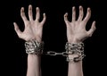 Hands tied chain, kidnapping, dependence, loneliness, social problem, halloween theme, black background Royalty Free Stock Photo