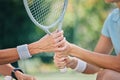 Hands together, tennis racket and coach with woman athlete, support and helping hand at training. Women, coaching and