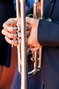 Hands on a trumpet close up. Royalty Free Stock Photo