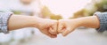 Hands of  two business people wear making a fist pump together after good deal. success and show strength power Royalty Free Stock Photo