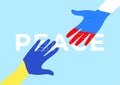 Hands of two citizens of Ukraine and Russia reach out to each other. Peace between Russia and Ukraine concept