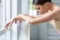 The hands of two classic ballet dancers at barre Royalty Free Stock Photo