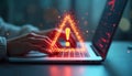 Hands type on laptop keyboard with glowing warning symbol. Digital alert displays risk or danger. Computer user sees security Royalty Free Stock Photo