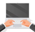 Hands type or print on laptop keyboard