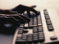 Hands typing on computer keyboard Royalty Free Stock Photo