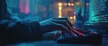 Hands typing on computer keyboard in coding workspace environment with visible coding symbols. Blurred background with c Royalty Free Stock Photo