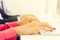 Hands typing on computer keyboards Royalty Free Stock Photo