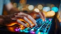 Hands typing on an illuminated mechanical keyboard in a dimly lit workspace Royalty Free Stock Photo