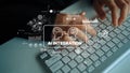 Hands Typing on Keyboard with AI Integration Concept and Data Visualization Graphics Displayed Over Laptop Surface Royalty Free Stock Photo