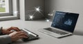 Hands typing on keyboard analyzing neural network data on laptop screen Royalty Free Stock Photo